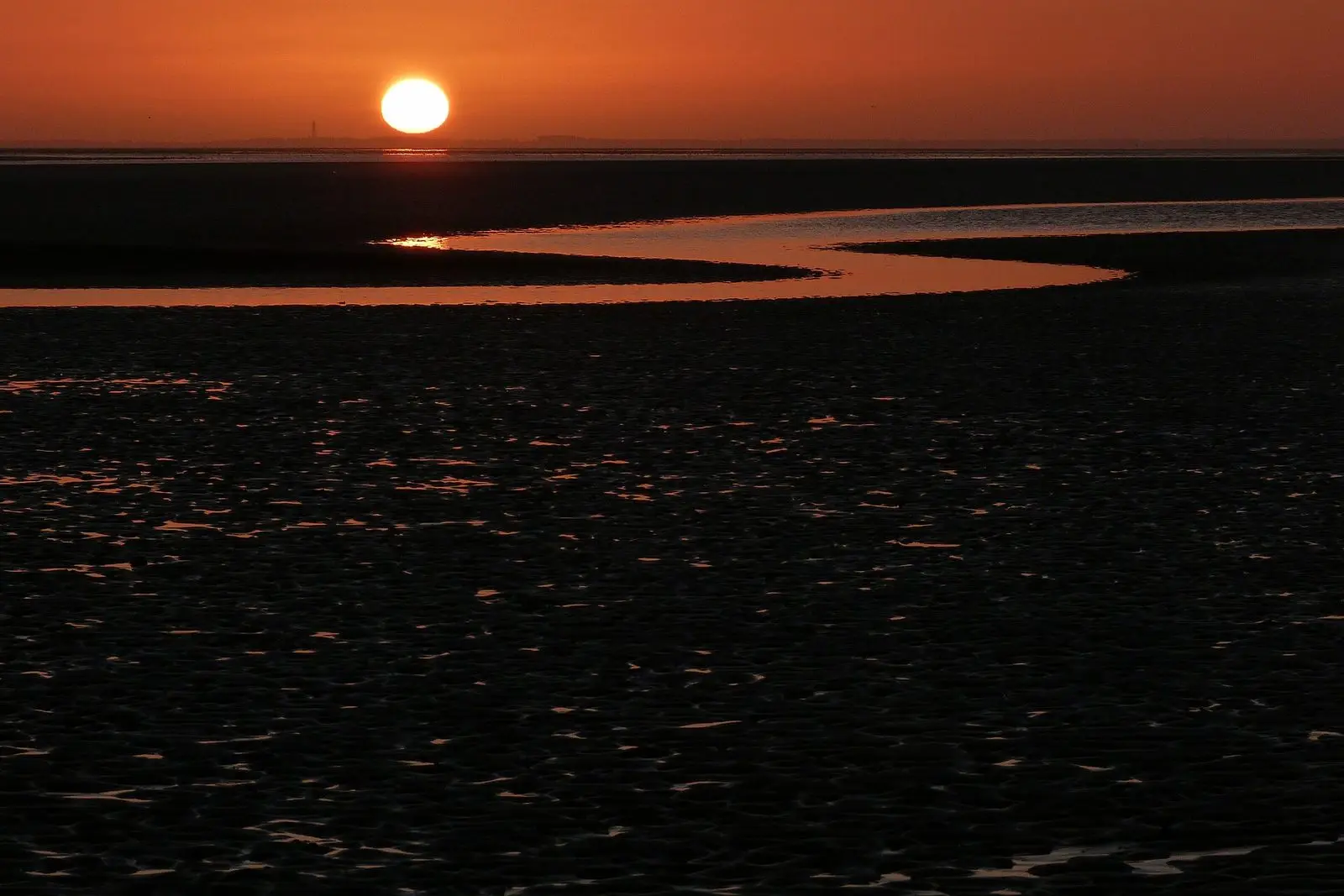 Sonnenuntergang über dem Wattenmeer vor Wyk